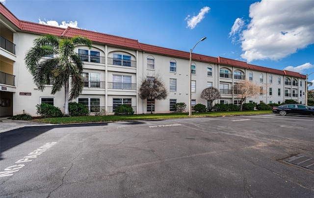 2700 Bayshore Blvd Unit 4304, Dunedin, FL 34698 - view of building exterior featuring uncovered parking