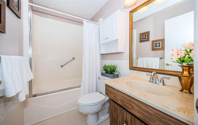 full bathroom featuring shower / tub combo, vanity, and toilet