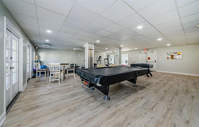 playroom featuring a paneled ceiling, french doors, billiards, and light hardwood / wood-style flooring