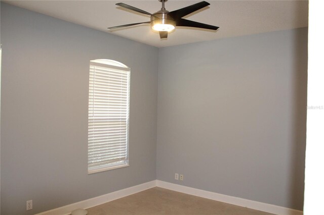 unfurnished room featuring ceiling fan