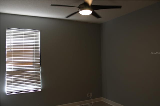 empty room featuring ceiling fan