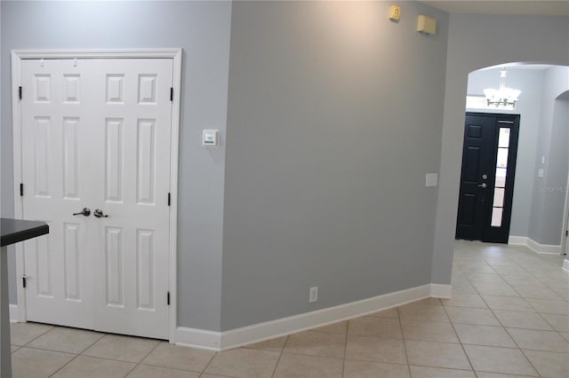 hallway featuring light tile patterned flooring