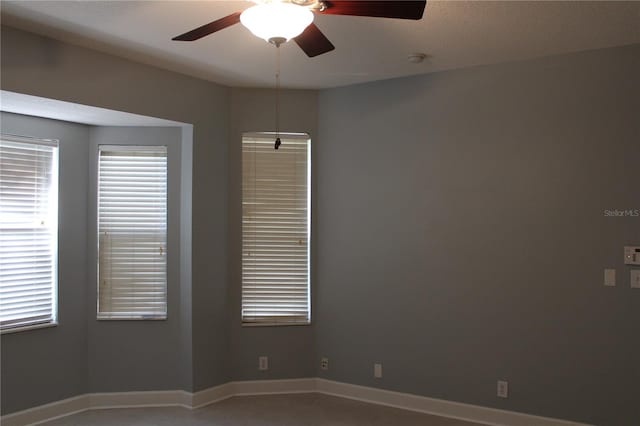 spare room featuring ceiling fan