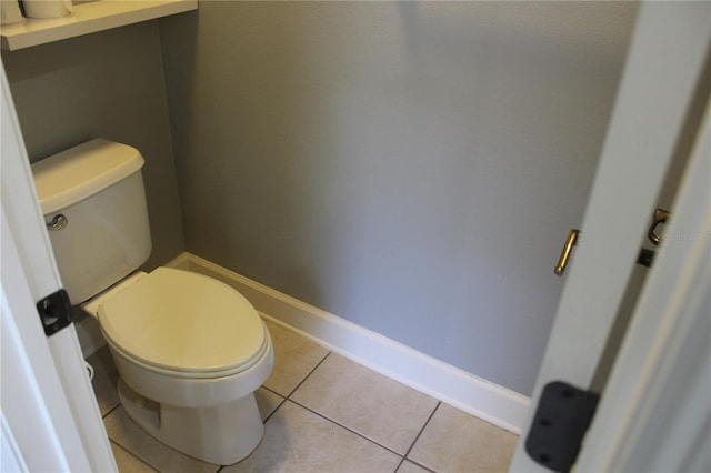 bathroom featuring tile patterned floors and toilet