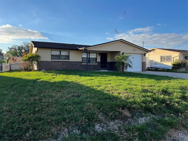 single story home featuring a front yard and a garage