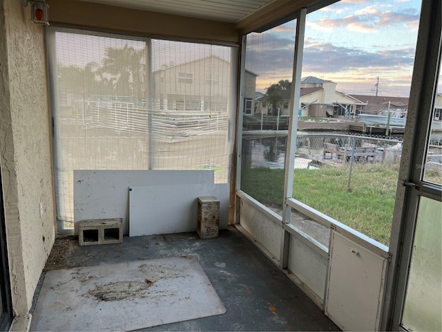 unfurnished sunroom featuring a healthy amount of sunlight