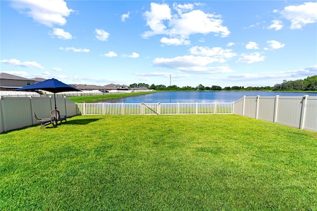 view of yard with a water view