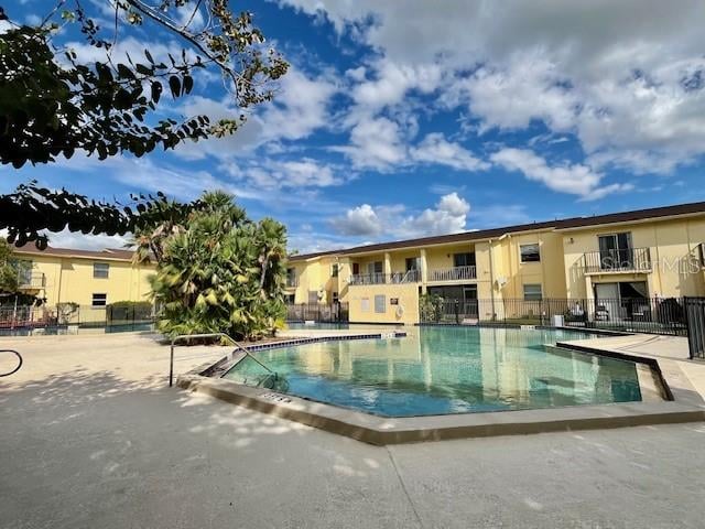 view of swimming pool featuring a patio