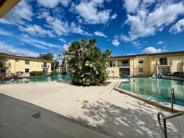 view of swimming pool featuring a patio