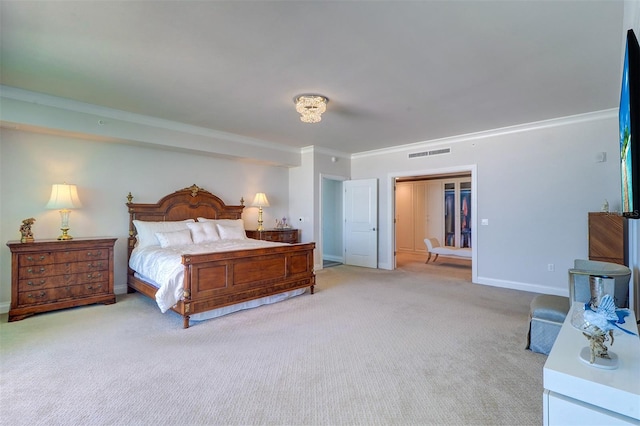 carpeted bedroom featuring crown molding and a closet