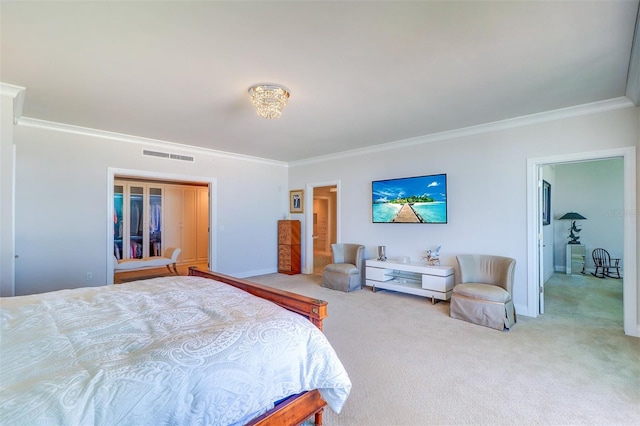 bedroom with carpet floors and ornamental molding