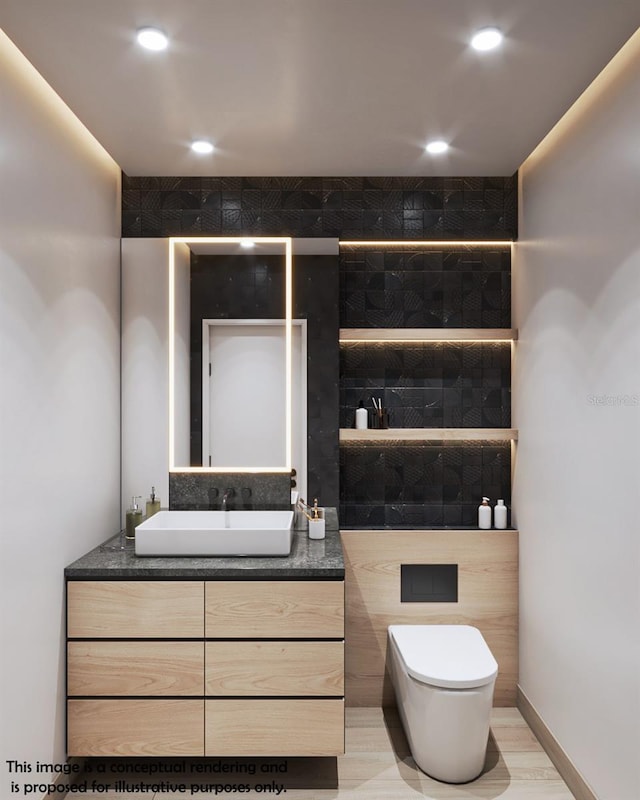 bathroom with vanity and toilet