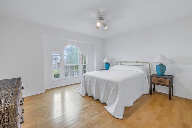 bedroom with light hardwood / wood-style flooring