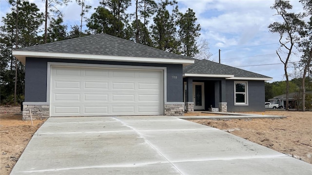 single story home with a shingled roof, stone siding, driveway, and stucco siding