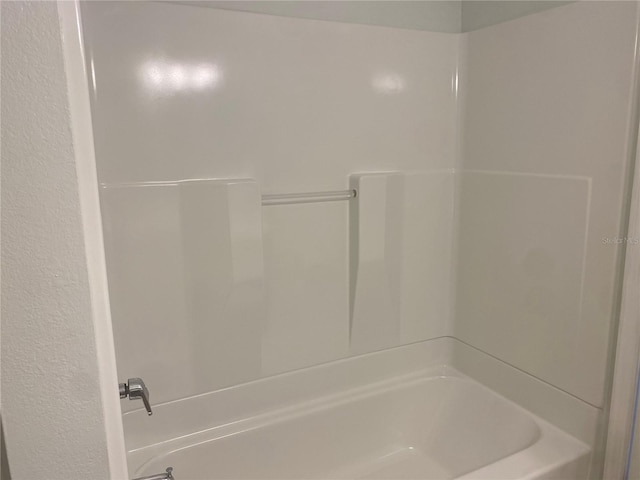 bathroom with shower / bathing tub combination