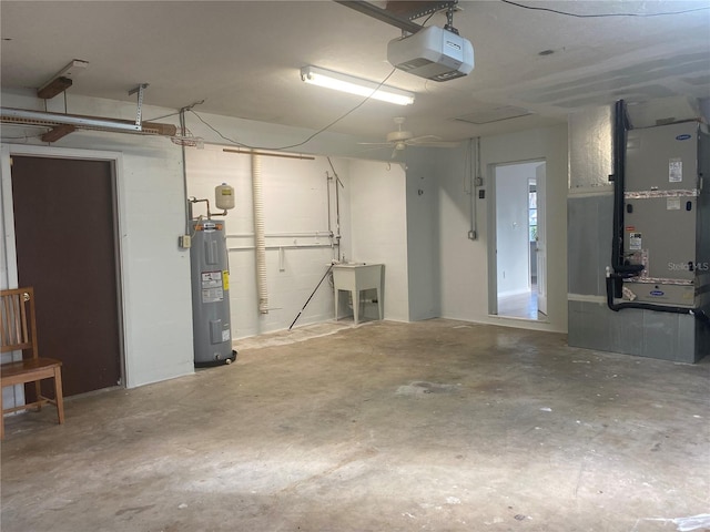 garage with heating unit, electric water heater, ceiling fan, and a garage door opener