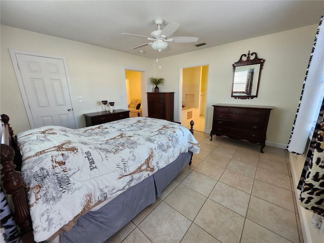 bedroom featuring light tile patterned floors, ceiling fan, and visible vents