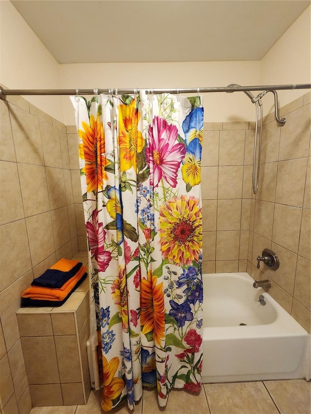 bathroom featuring shower / bath combination with curtain and tile patterned floors