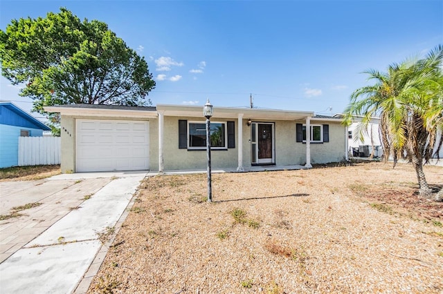 ranch-style home with a garage