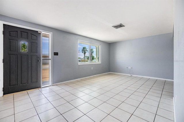 foyer entrance featuring light tile patterned floors