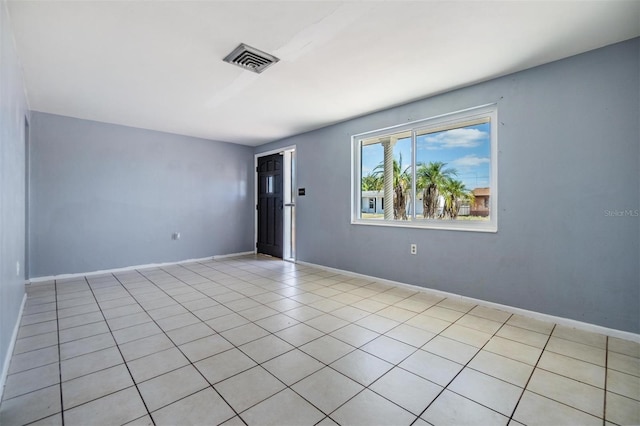 empty room featuring light tile patterned flooring