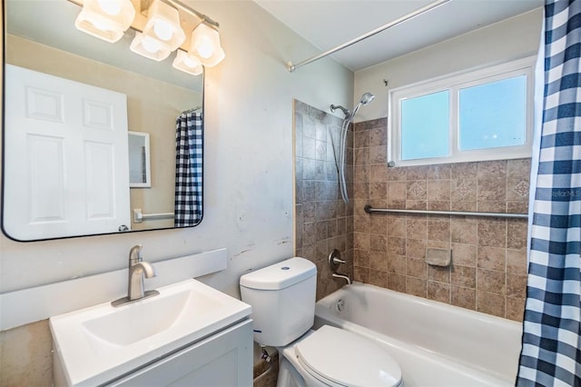 full bathroom featuring vanity, shower / bath combo, and toilet