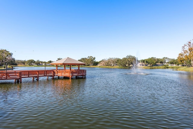 dock area featuring a gazebo and a water view