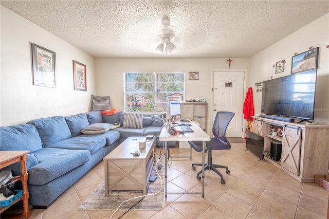 office space featuring light tile patterned floors and a textured ceiling