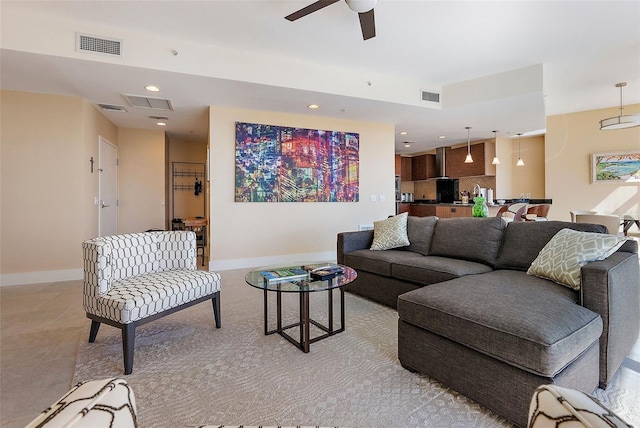 living room with ceiling fan