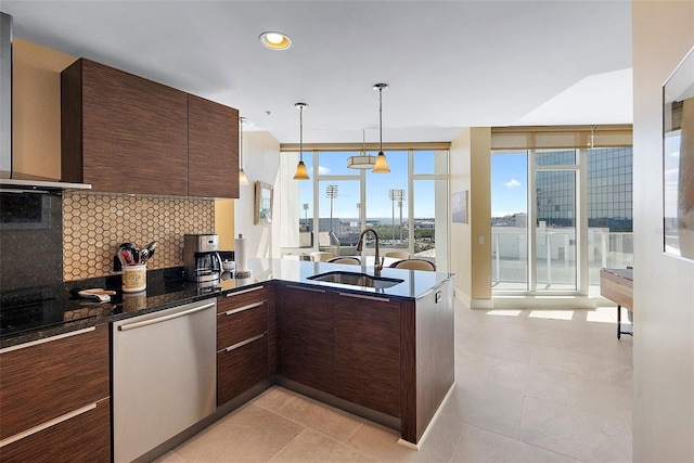 kitchen with sink, stainless steel dishwasher, decorative backsplash, dark brown cabinets, and kitchen peninsula