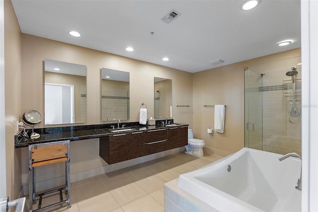 full bathroom featuring tile patterned flooring, vanity, toilet, and plus walk in shower