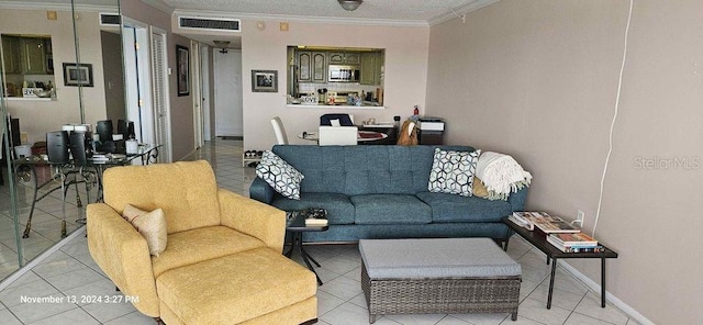 17920 Gulf Blvd Unit 1508, Redington Shores, FL 33708 - living area with ornamental molding and light tile patterned floors