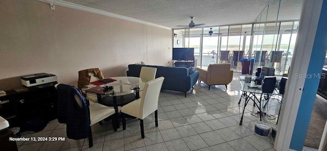 17920 Gulf Blvd Unit 1508, Redington Shores, FL 33708 - dining room featuring a ceiling fan, crown molding, floor to ceiling windows, a textured ceiling, and light tile patterned flooring