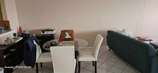 17920 Gulf Blvd Unit 1508, Redington Shores, FL 33708 - dining area with light tile patterned floors