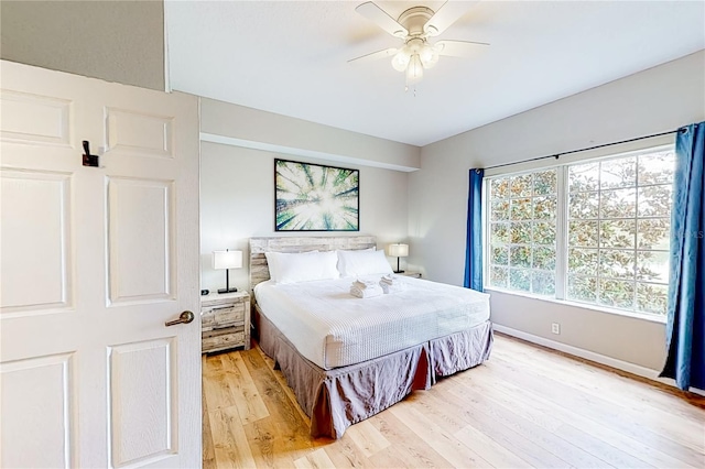 bedroom featuring ceiling fan and light wood-type flooring