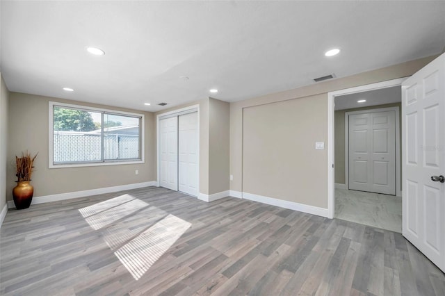 interior space with light hardwood / wood-style flooring