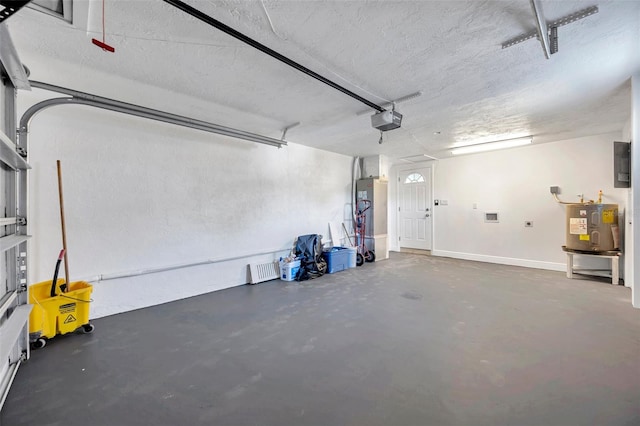 garage with a garage door opener and water heater