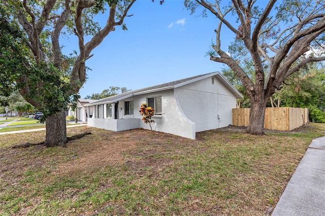 view of property exterior featuring a yard