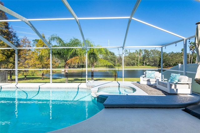 view of pool featuring a lanai, an outdoor hangout area, and an in ground hot tub