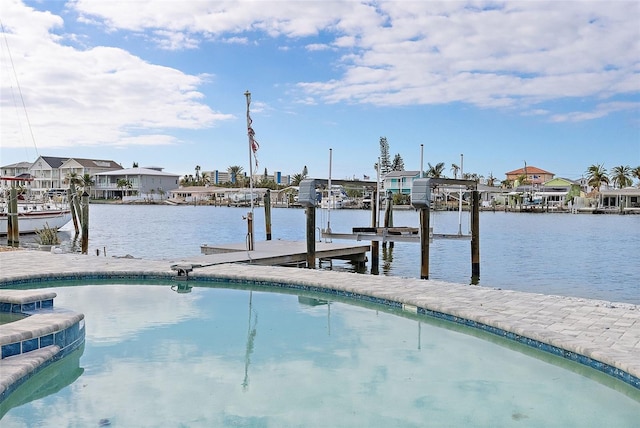 dock area with a water view