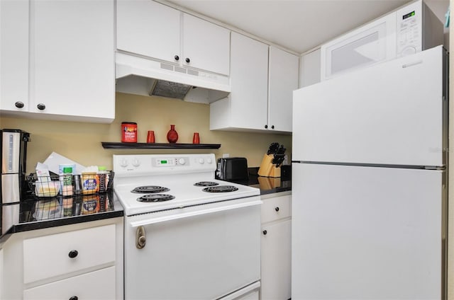 kitchen featuring white cabinets and white appliances