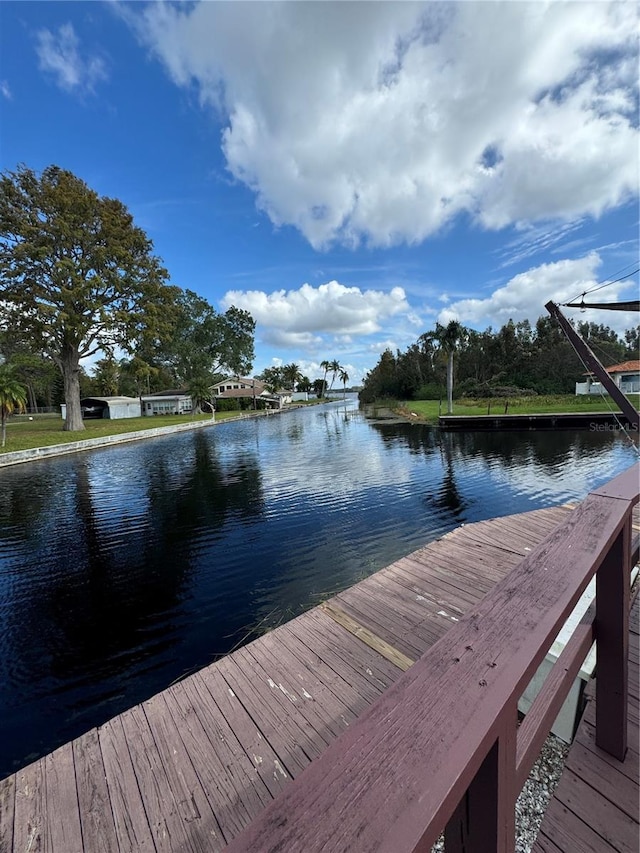 dock area featuring a water view