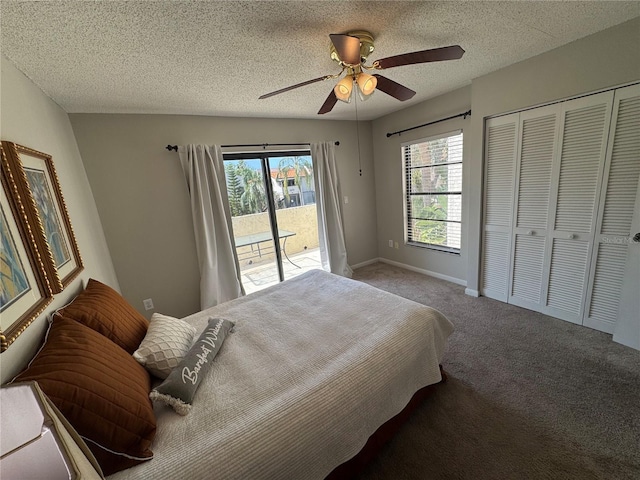 bedroom with ceiling fan, carpet, a closet, a textured ceiling, and access to outside