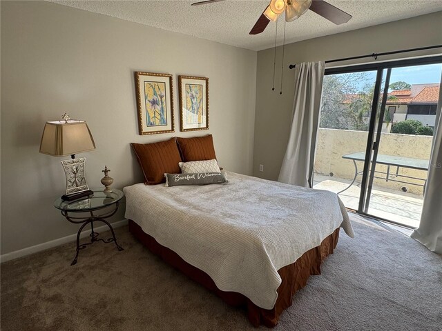 bedroom with access to exterior, baseboards, a textured ceiling, and carpet