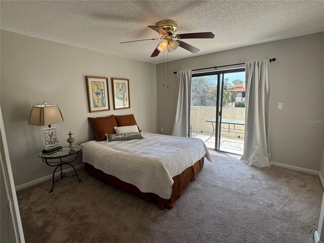 bedroom featuring access to exterior, ceiling fan, baseboards, carpet flooring, and a textured ceiling