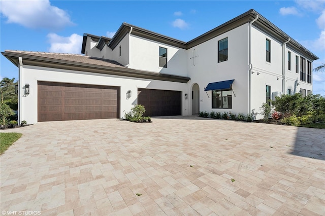 view of front of house with a garage