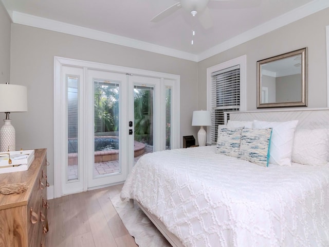 bedroom with french doors, crown molding, light wood-type flooring, ceiling fan, and access to exterior