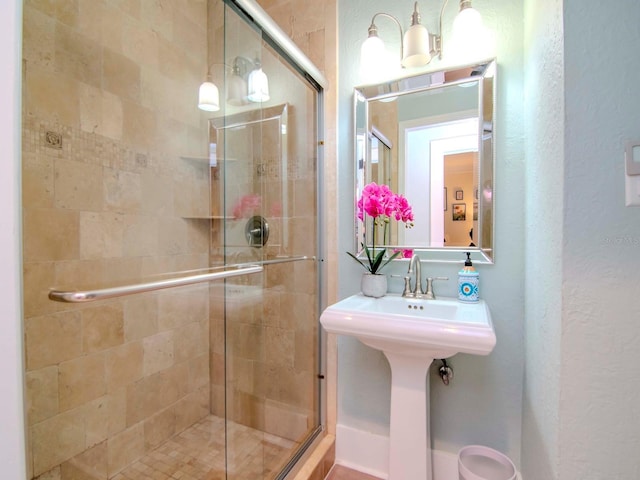 bathroom featuring an enclosed shower