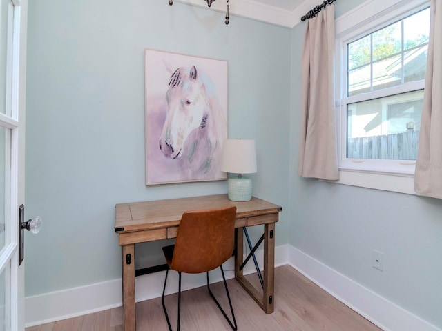 office space with light hardwood / wood-style flooring