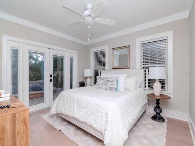 bedroom featuring crown molding, light hardwood / wood-style flooring, ceiling fan, access to outside, and french doors